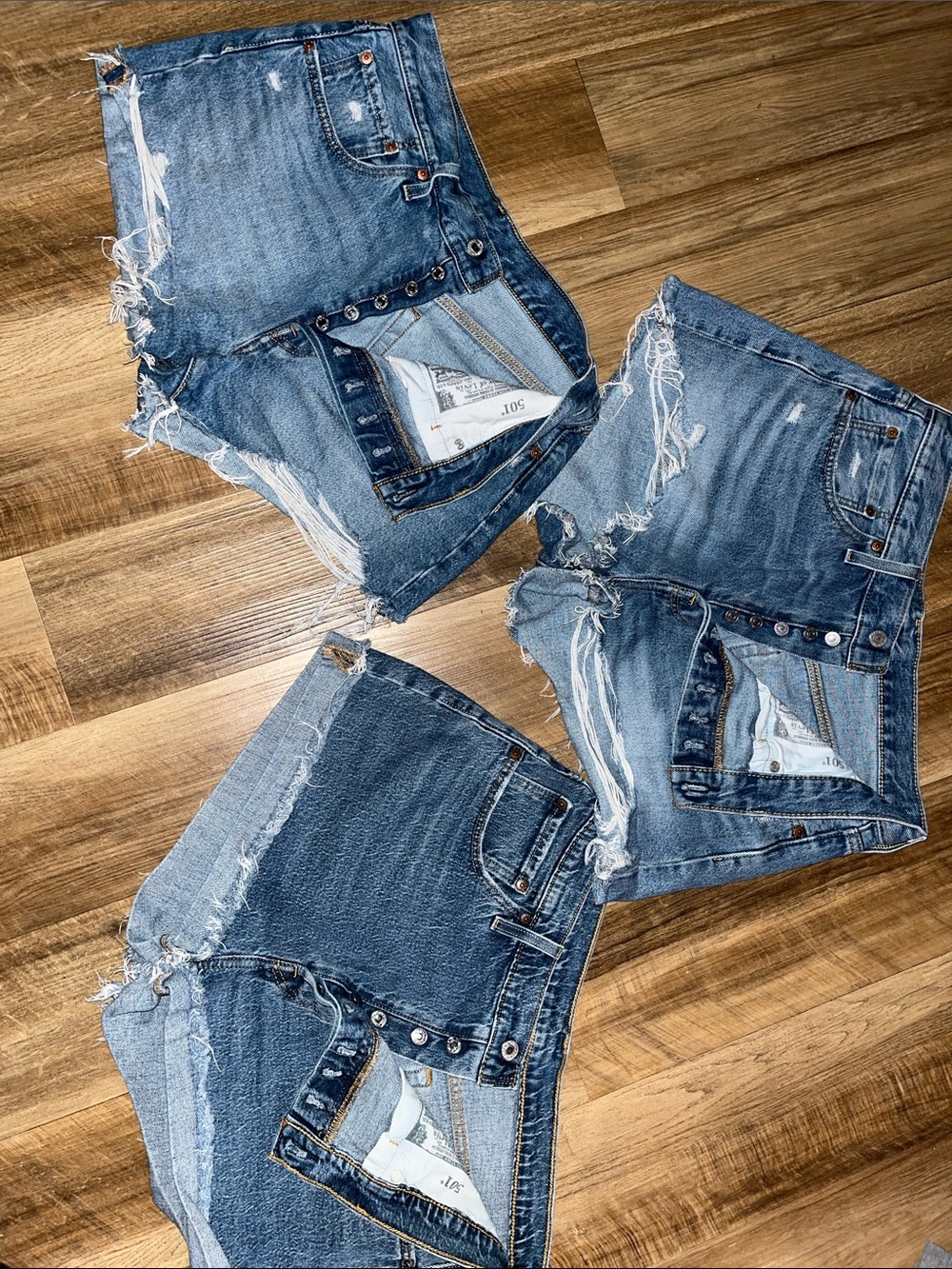 Women's Distressed Blue Denim Jean Shorts with Frayed Hem